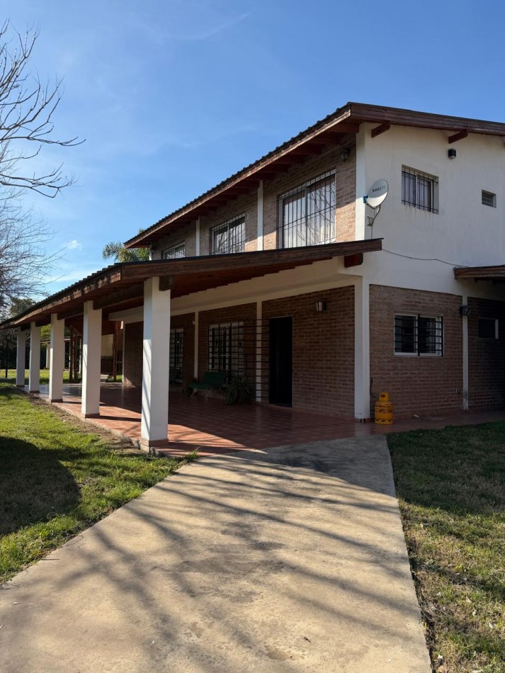 EXCEPCIONAL PROPIEDAD emplazada sobre un amplio lote de mas de 1500m² en 20 DE JUNIO